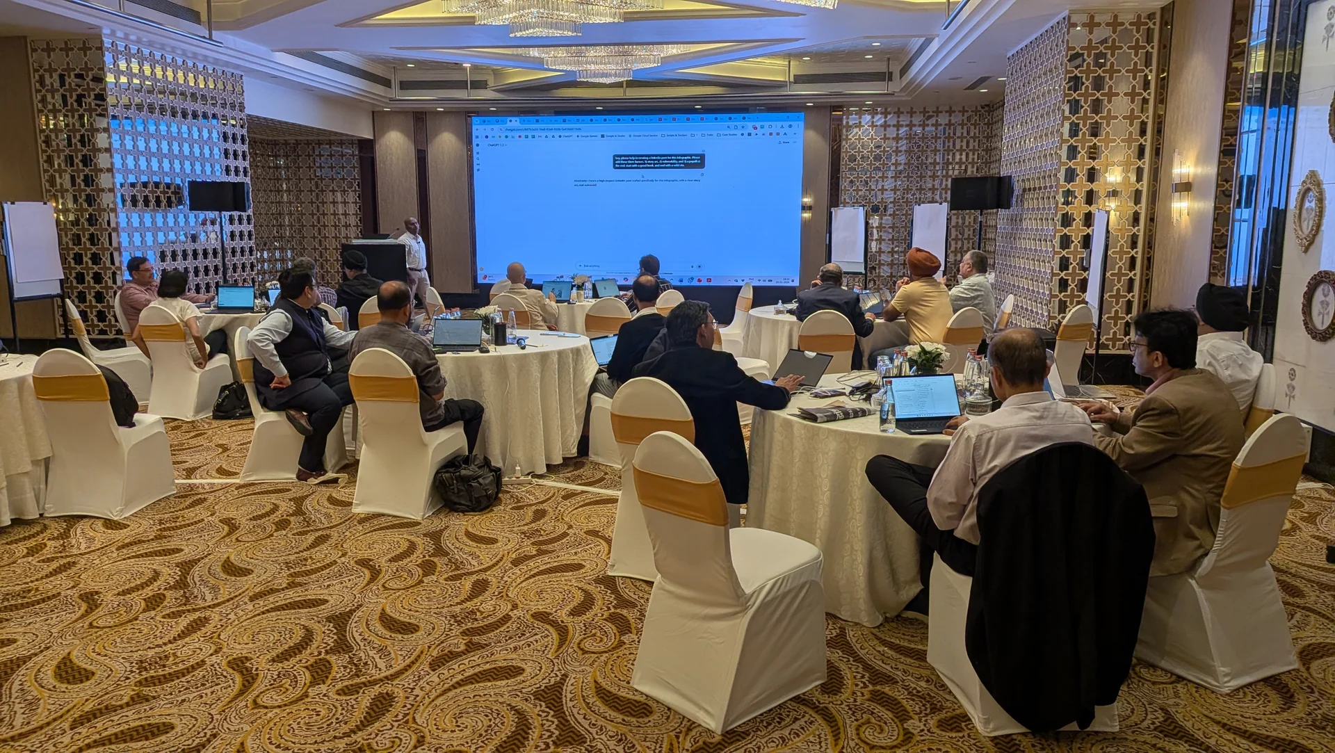 Rahul G. Iyer leading an applied AI session with a board and senior leadership team